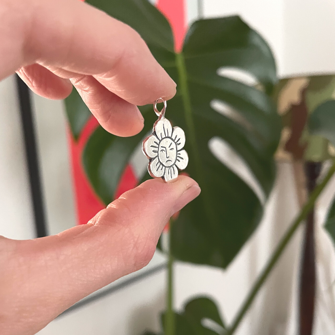 grumpy flower silver pendant