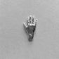 hand shaped silver body part pendant