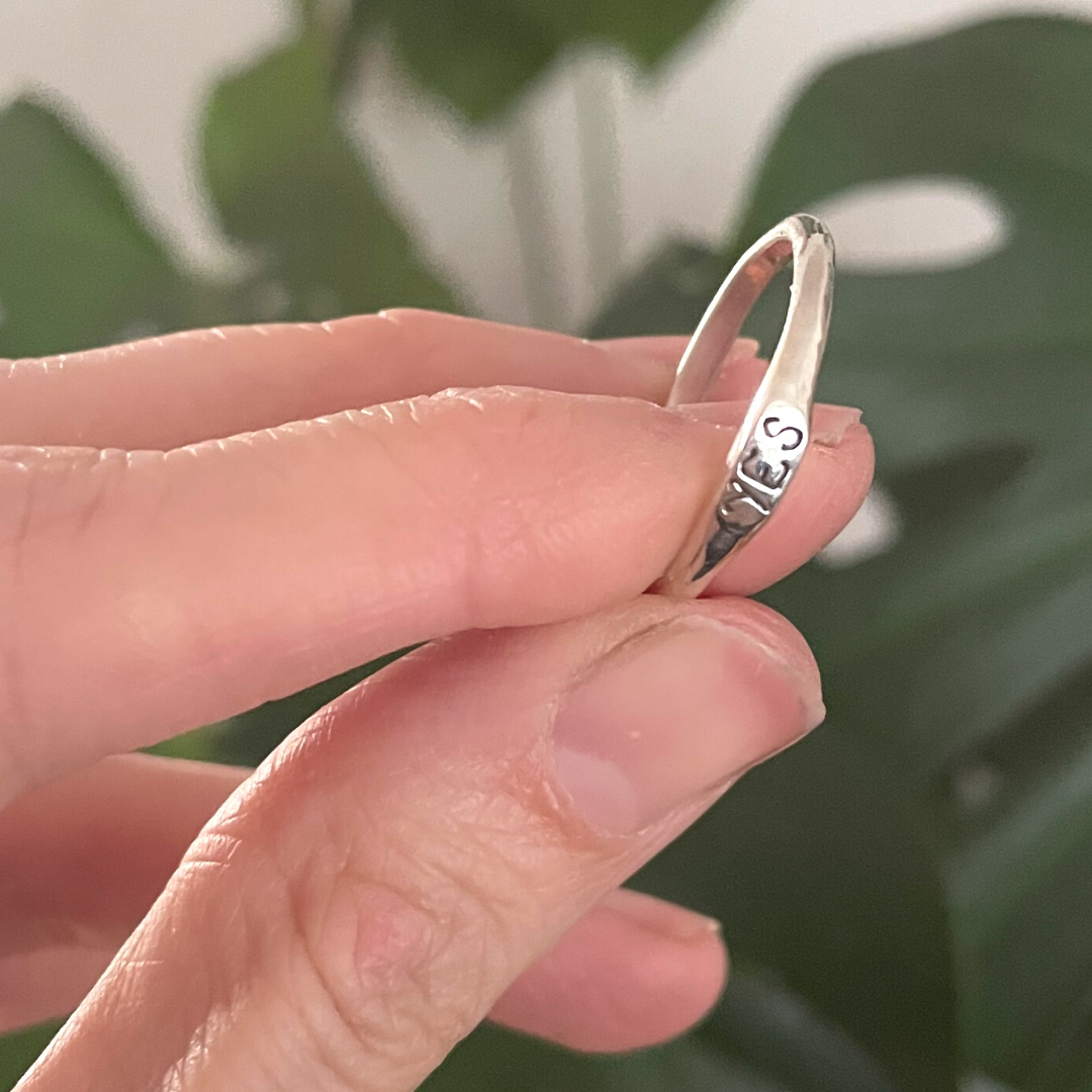 delicate silver band ring with engraved yes